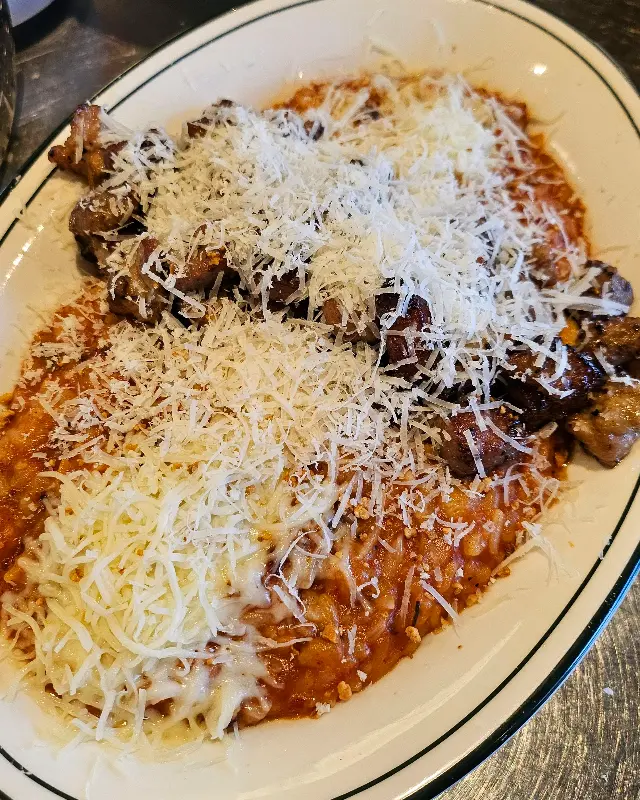 고소한 치즈가 듬뿍 올려진 리조또