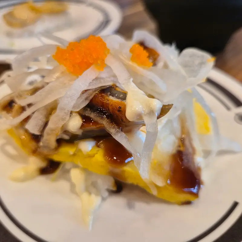 초밥 위에 올려진 토핑