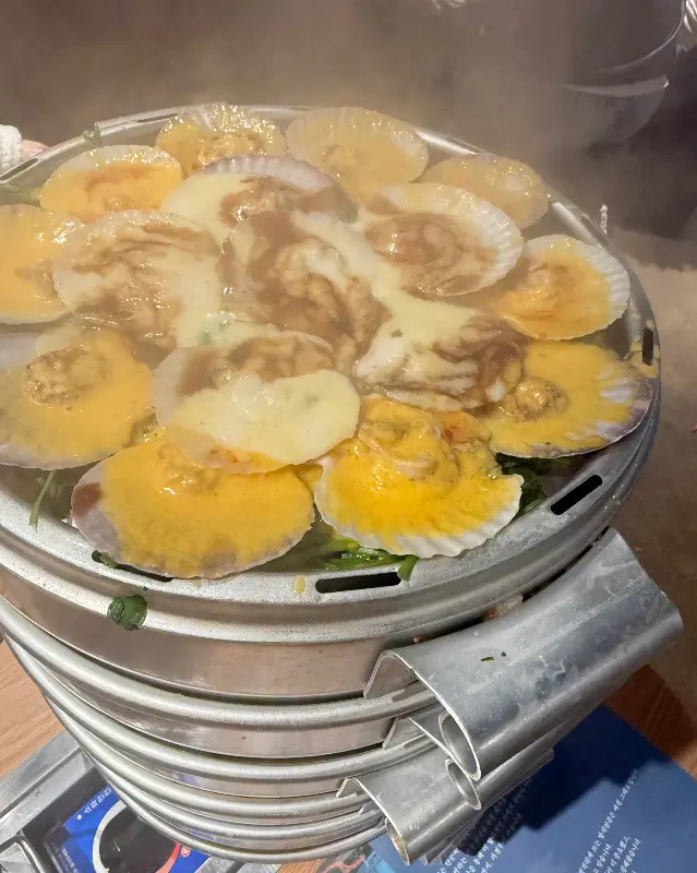 치즈가 듬뿍 올려진 가리비