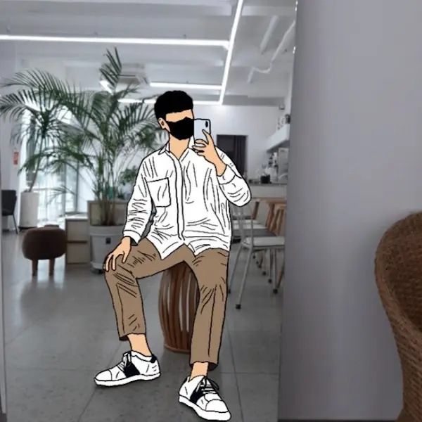 거울에 비친 캐주얼한 옷차림의 남성