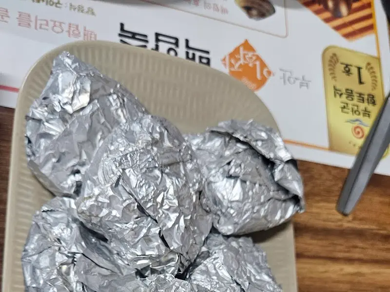 은박지에 감싸져 나온 백합구이