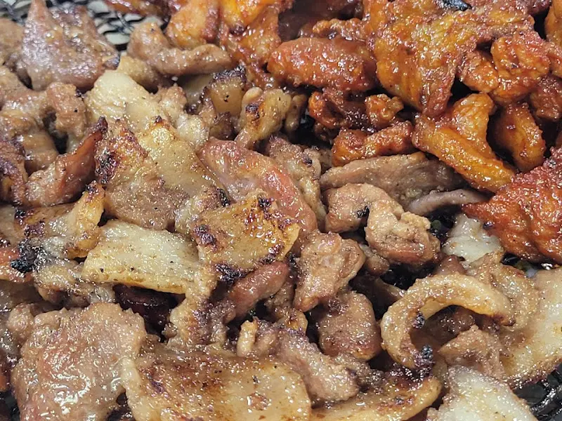 석쇠 위에서 지글지글 익어가는 고추장 석쇠불고기