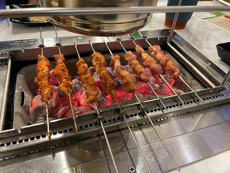 숯불 위에서 익어가는 양꼬치