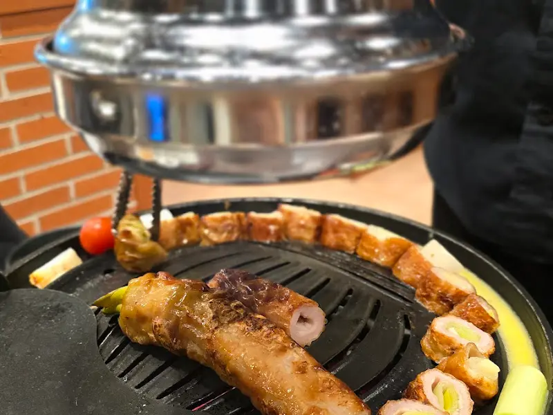 초벌된 막창과 통마늘의 조화