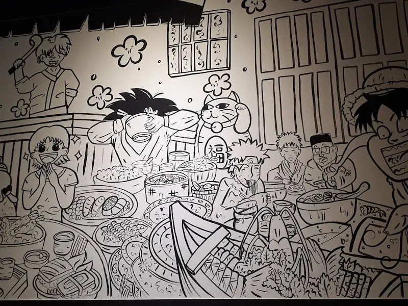 벽에 그려진 일본 애니메이션 캐릭터 그림