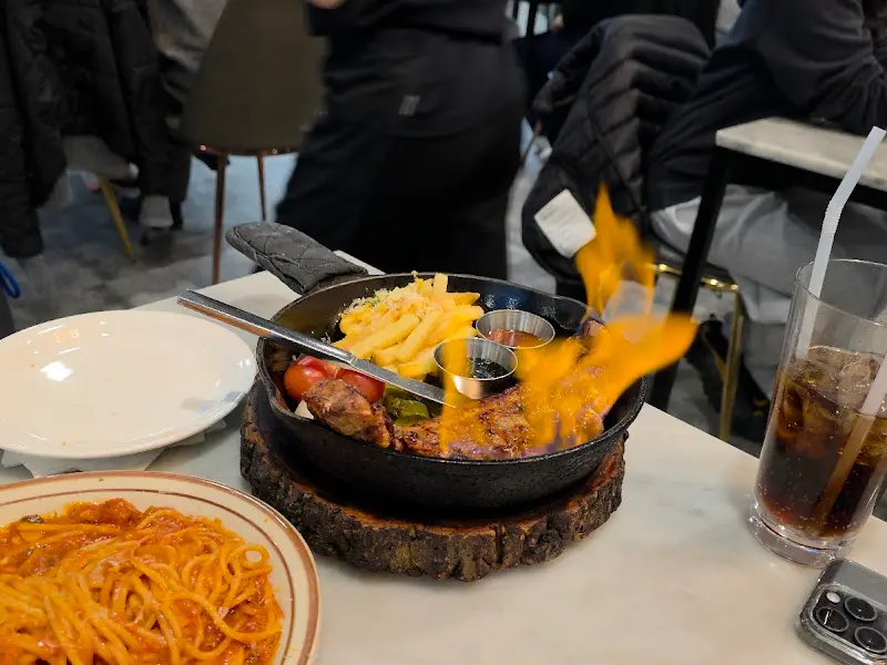 불쇼가 펼쳐지는 통삼겹 스테이크