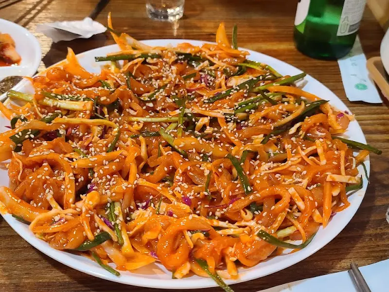 새콤달콤한 양념에 버무려진 아귀포