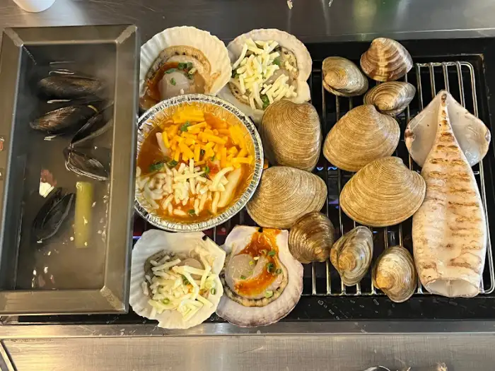 selection of grilled seafood and vegetables